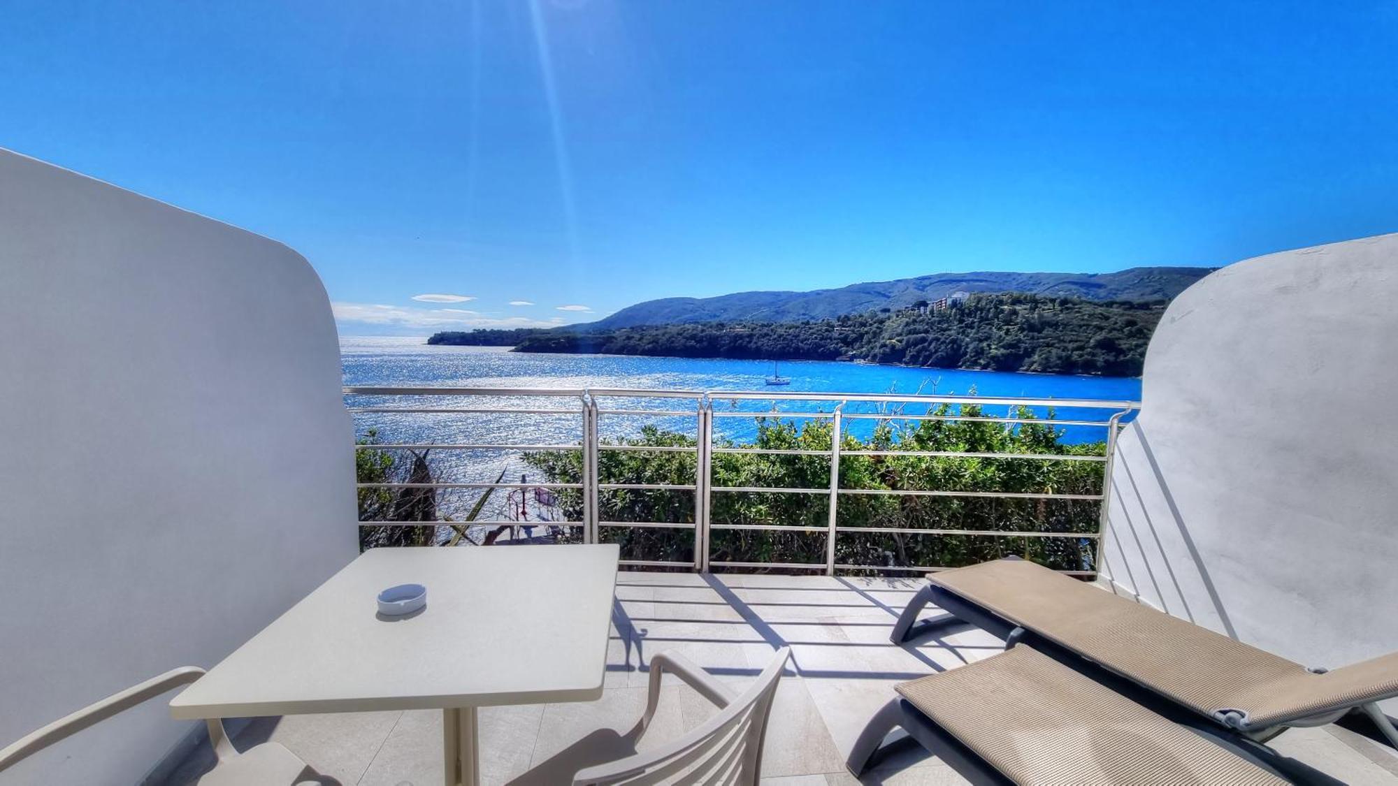 Hotel Plaza Porto Azzurro Pokoj fotografie