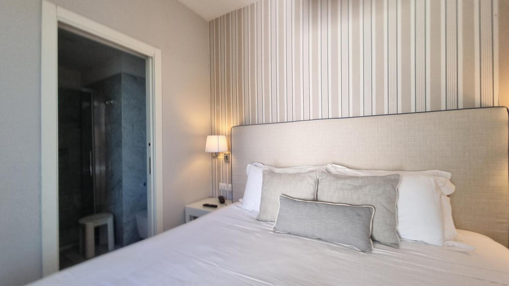 Hotel Plaza Porto Azzurro Pokoj fotografie